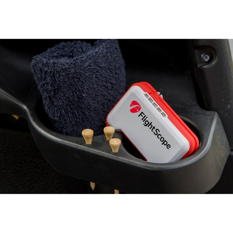 Flightscope Mevo Golf Launch Monitor im Trolley mit Tees und Handtuch