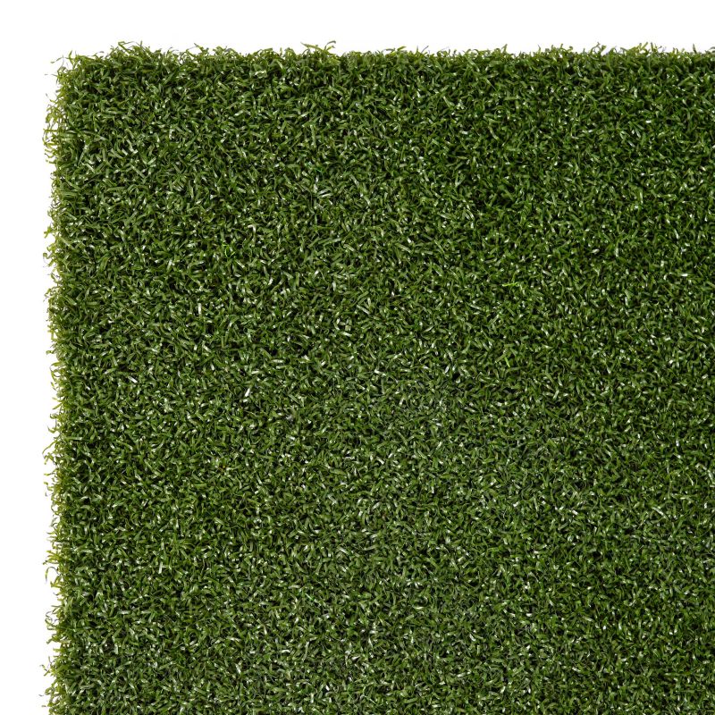 Tee Turf Golfmat van SimSpace voor  golfsimulator ingezoomd op hoek en het nylon gras